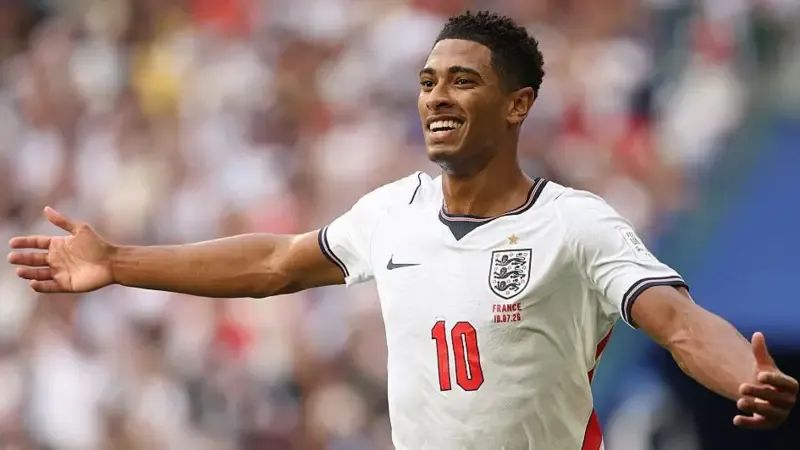 Jude Bellingham celebrates scoring for England