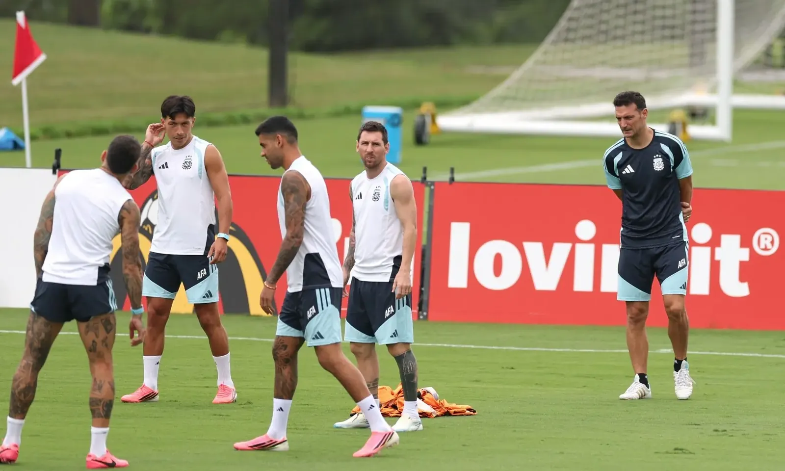 Argentina’s head coach Lionel Scaloni (R) walks on the pitch next to forward #10 Lionel Messi during a training session on the eve of the 2026 World Cup football tournament semi-final match between England and Argentina, at Atlanta United Training Centre in Atlanta on July 14, 2026. —AFP