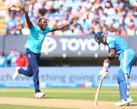 Jofra Archer celebrates taking the wicket of Virat Kohli as India chase 259 to beat England at Edgbaston.