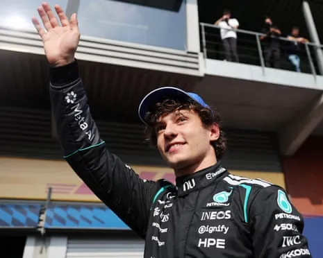 Mercedes' Kimi Antonelli celebrates after qualifying in pole position.
